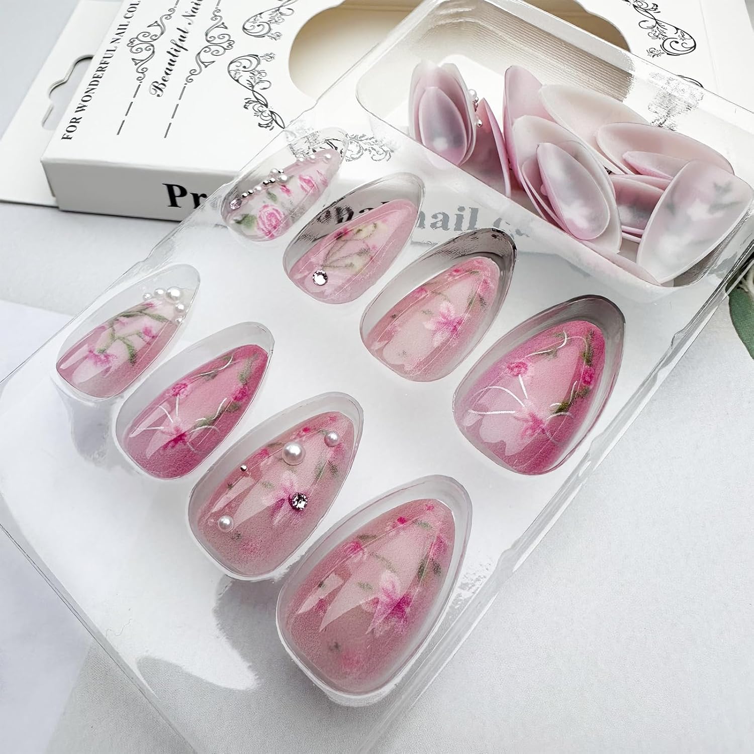 Peach Blossom Press on Nails Short Medium Almond Fake Nails with 3D Pearl Diamond Designs Pink Flower Full Cover Stick on Nails Pink White Gradient Glossy Acrylic Nails False Nails for Women 24Pcs