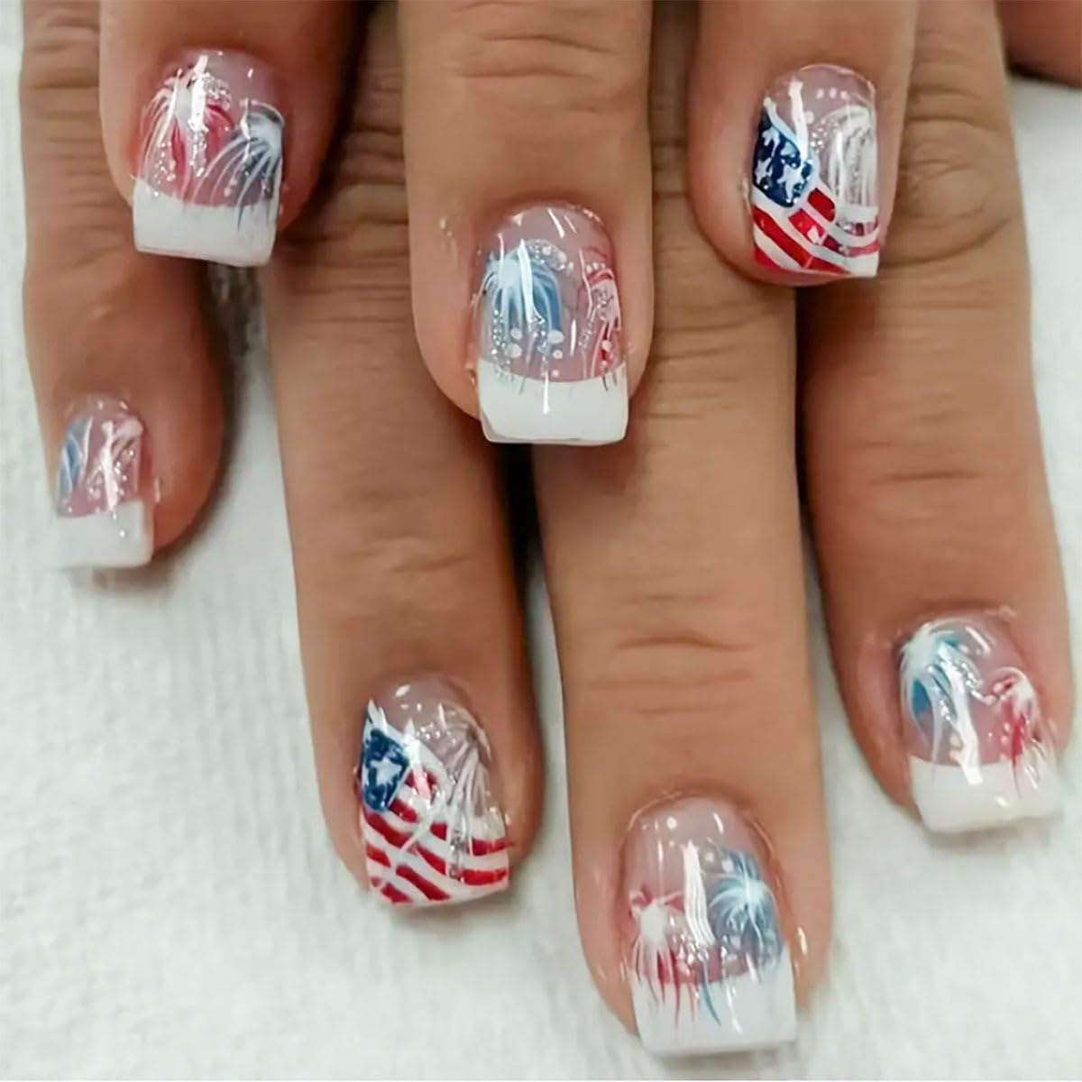 Medium Press on Nails Independence Day Fake Nails with Fireworks and Stripe Designs Bald Eagle Glue on Nails 4th of July Flag Stick on Nails Blue Red Glue on Nails for Women Girls 24Pcs