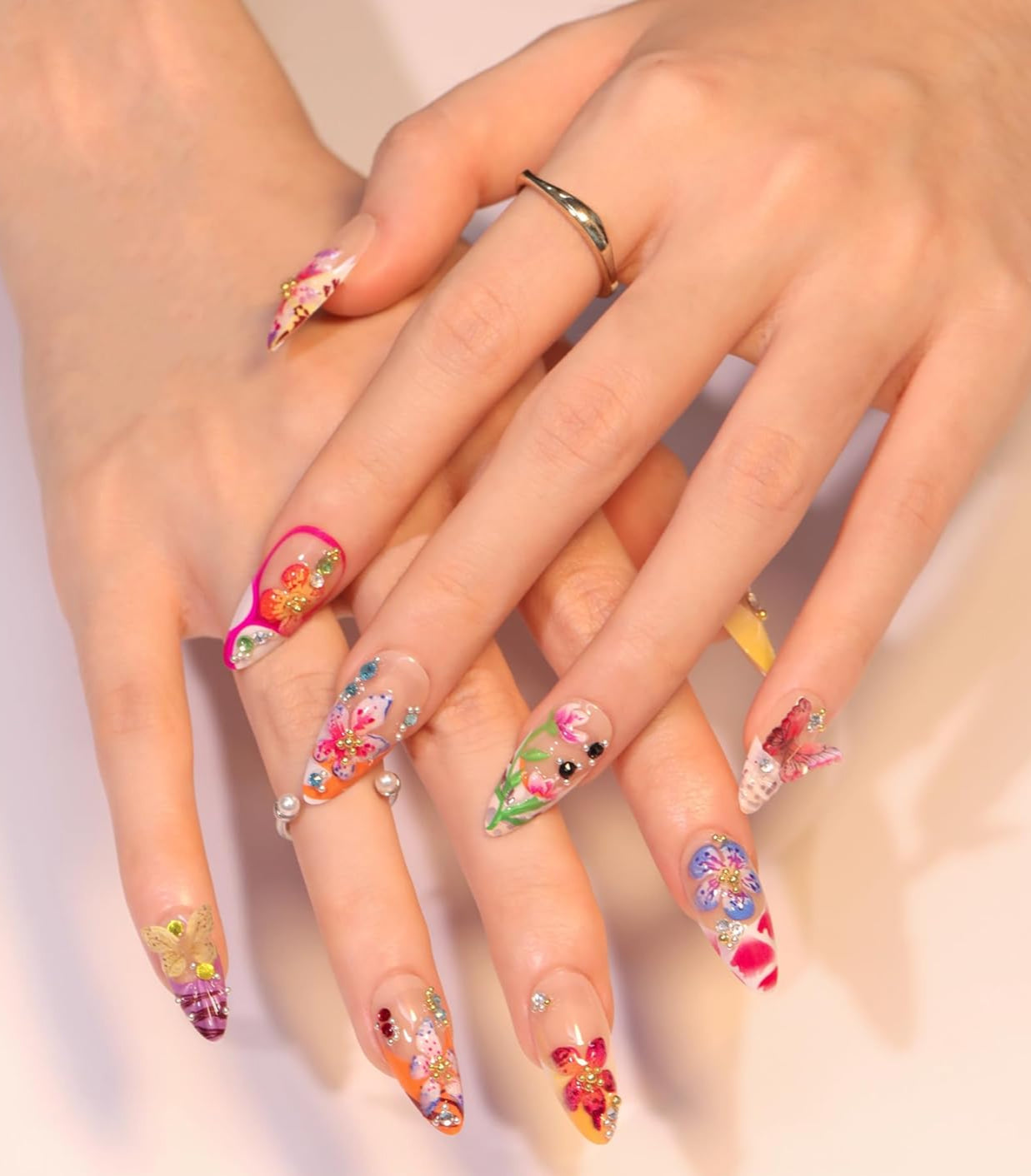 24Pcs Flower Press on Nails Medium Almond Fake Nails with 3D Colorful Spring Floral Butterfly Design Gold Beads Rhinestones Charms False Nails French Tips Glue on Nails for Women Daily Wear