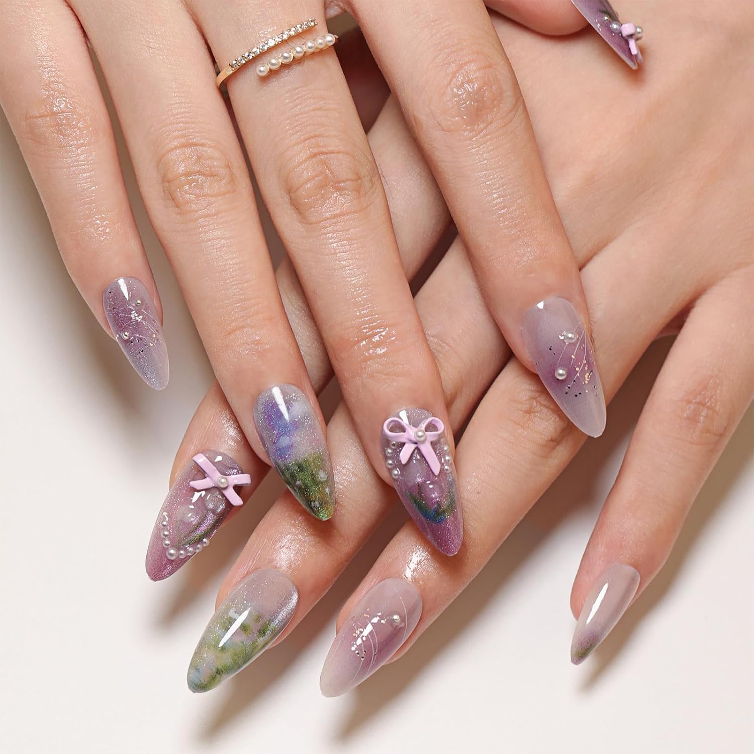 Nails with decorative designs on a light background